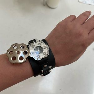 Vintage watch with leather band with decorative bullets